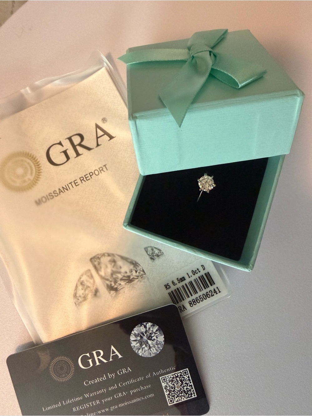 Moissanite Solitaire Ring in Mint Box, size 6